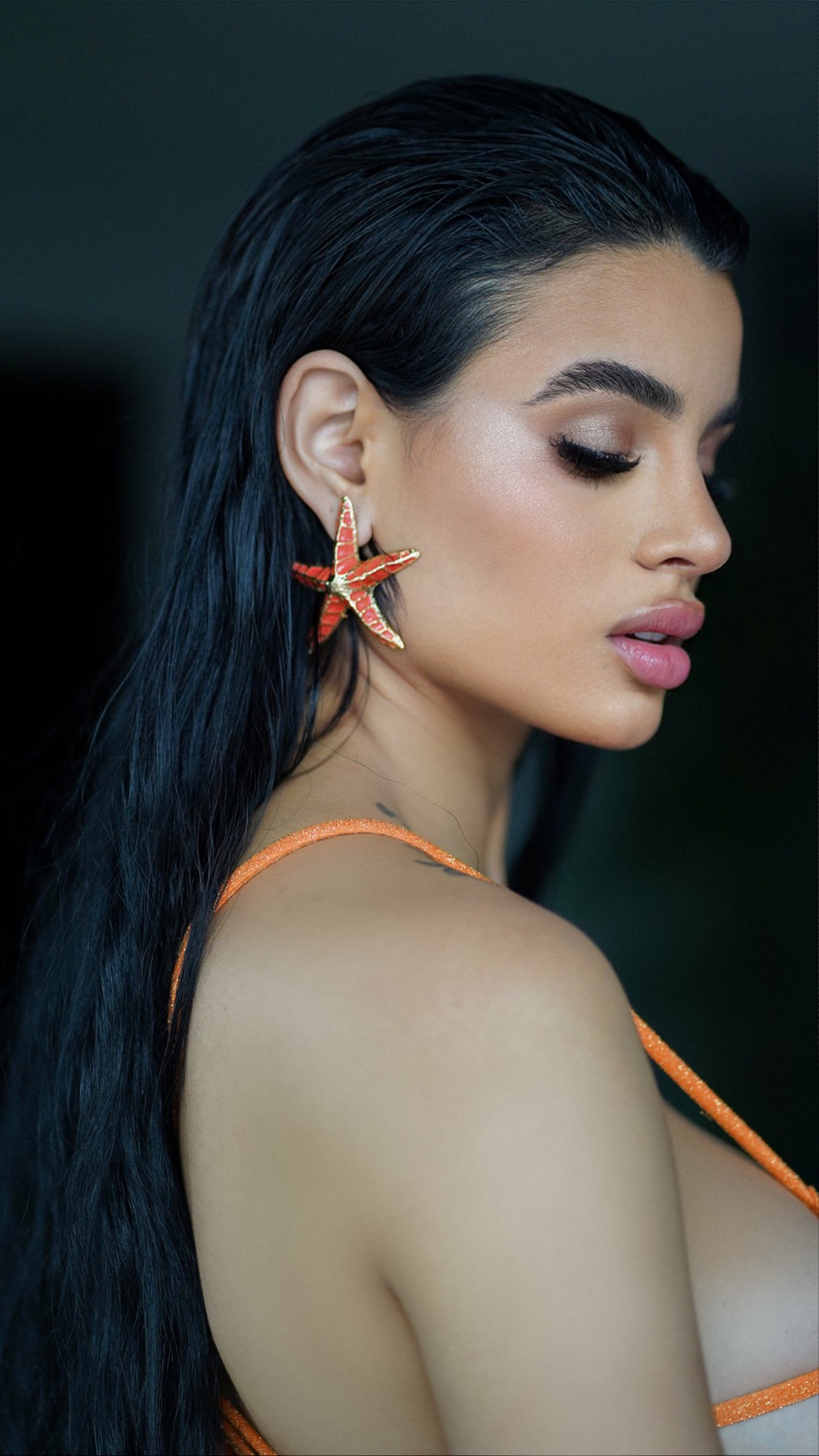 Orange metal starfish earrings