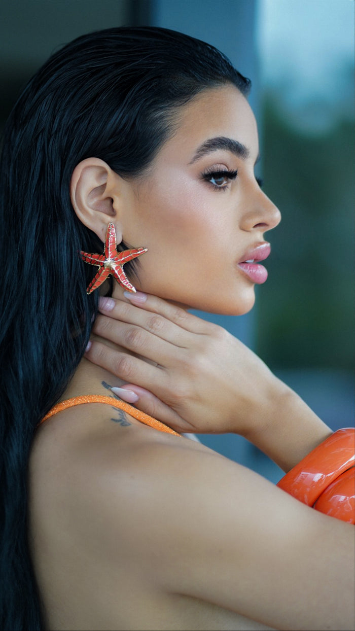 Orange metal starfish earrings
